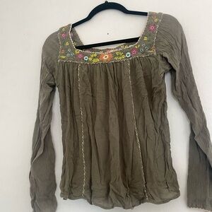 beautiful military green blouse. Perfect for any season.